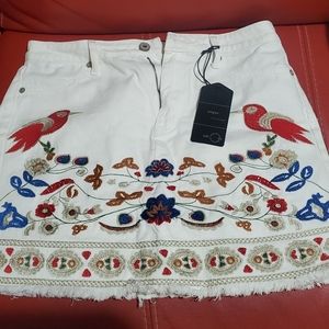 Umgee white denim embroidered mini skirt.